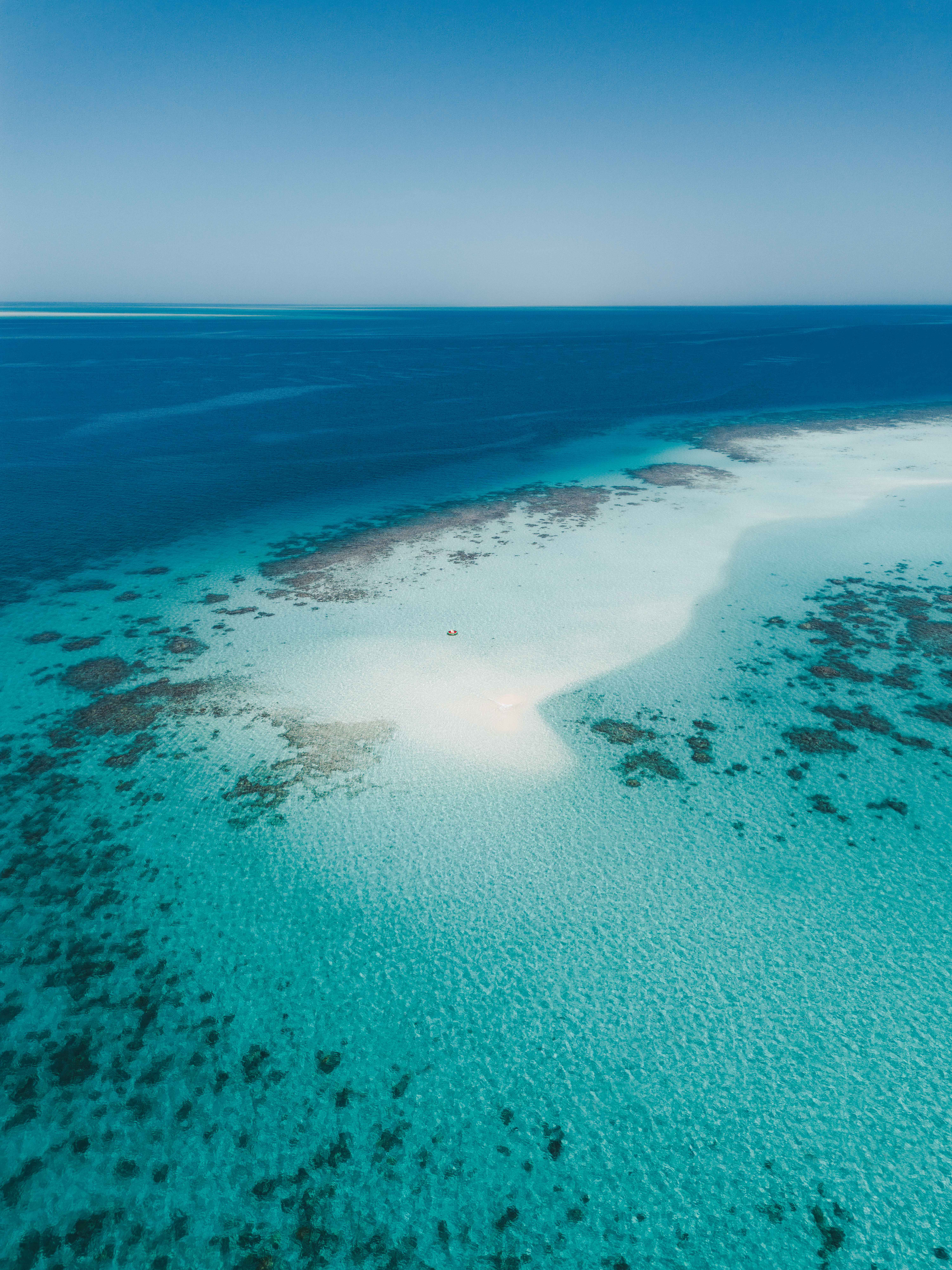 Red Sea paradise captured from the sky! Stunning aerial view showcases crystal-clear waters and white sand beaches.
